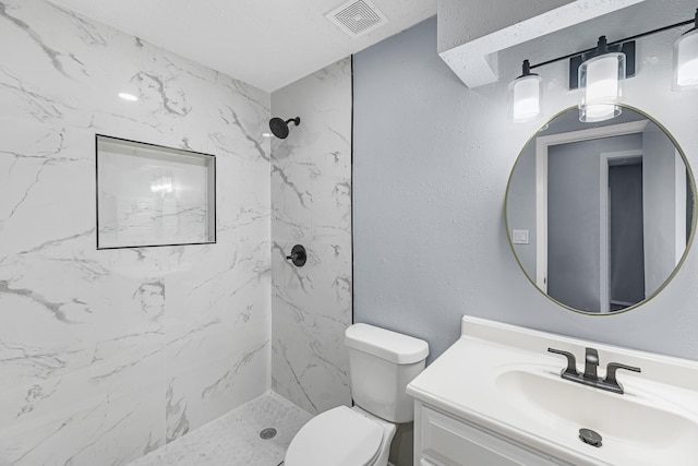 14234 Cellini Dr, Cypress, TX 77429 - bathroom featuring vanity and a marble finish shower