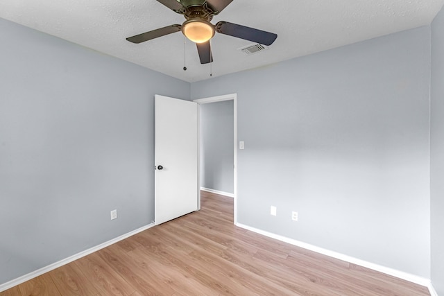 14234 Cellini Dr, Cypress, TX 77429 - empty room with light wood-style flooring and ceiling fan
