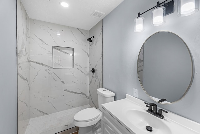14234 Cellini Dr, Cypress, TX 77429 - bathroom with vanity, a marble finish shower, and recessed lighting