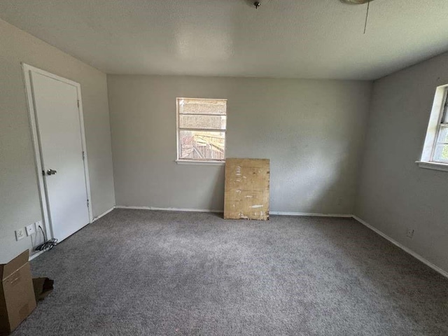 5431 45th St, Lubbock, TX 79414 - carpeted spare room featuring baseboards