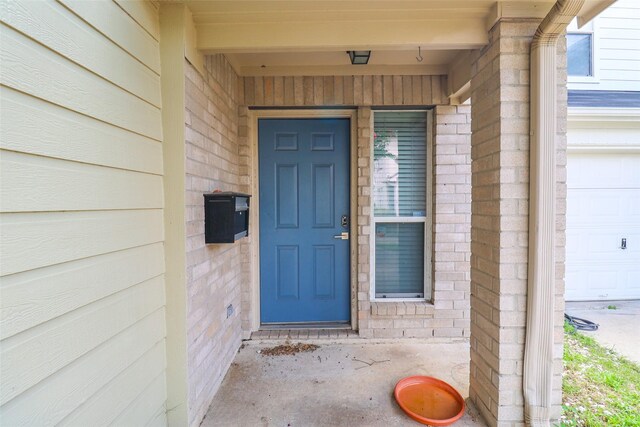 1515 Saulnier St, Houston, TX 77019 - view of exterior entry featuring brick siding