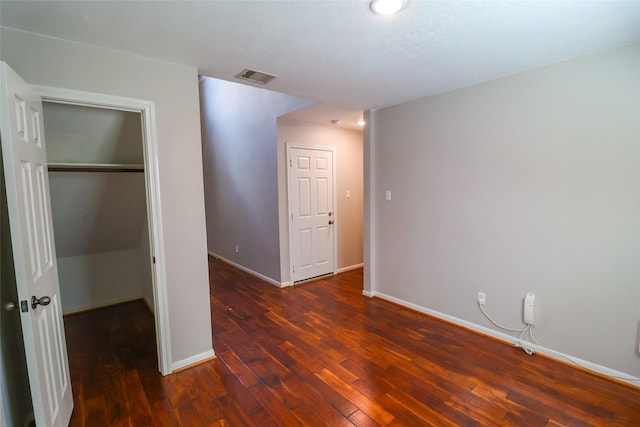 1515 Saulnier St, Houston, TX 77019 - unfurnished bedroom featuring hardwood / wood-style flooring and a closet
