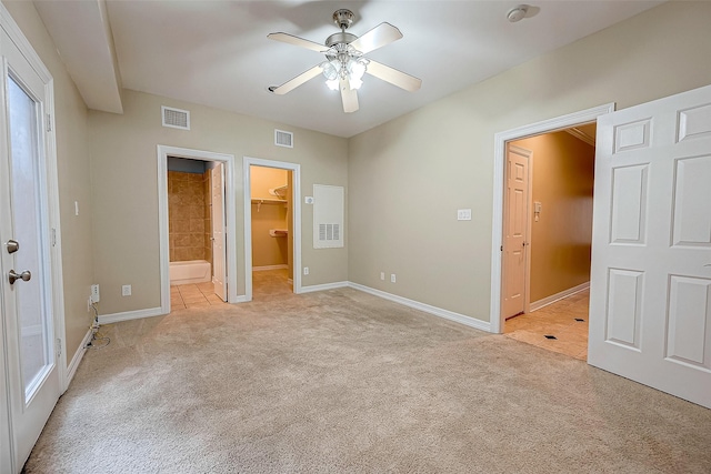 5331 Nolda St Unit A, Houston, TX 77007 - unfurnished bedroom with light colored carpet, a spacious closet, a closet, a ceiling fan, and ensuite bath