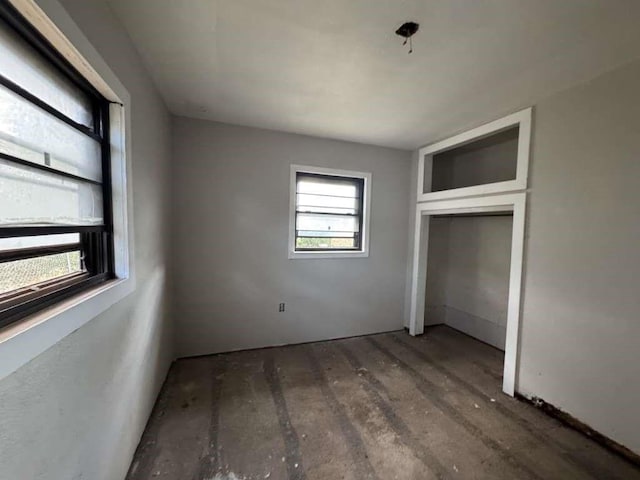 904 E Stanford St, Lubbock, TX 79403 - unfurnished bedroom featuring wood finished floors and a closet
