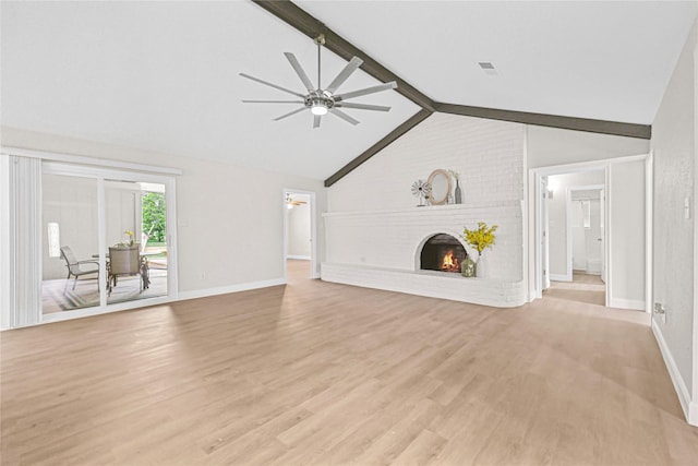 3101 Possum Trot St, Brenham, TX 77833 - unfurnished living room featuring ceiling fan, light wood-style flooring, and a brick fireplace