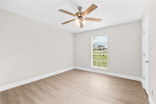 3101 Possum Trot St, Brenham, TX 77833 - empty room with light wood-style flooring and ceiling fan