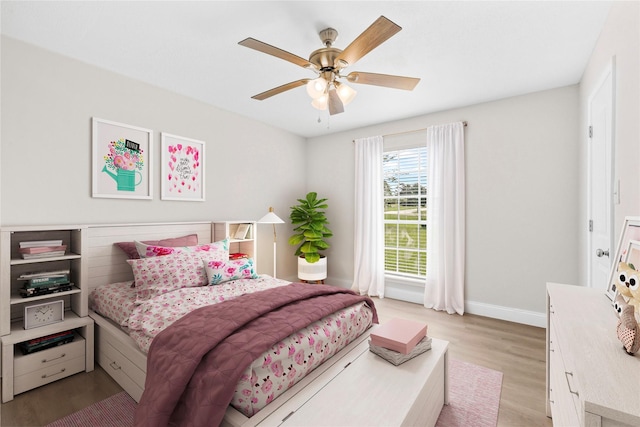 3101 Possum Trot St, Brenham, TX 77833 - bedroom featuring wood finished floors and ceiling fan