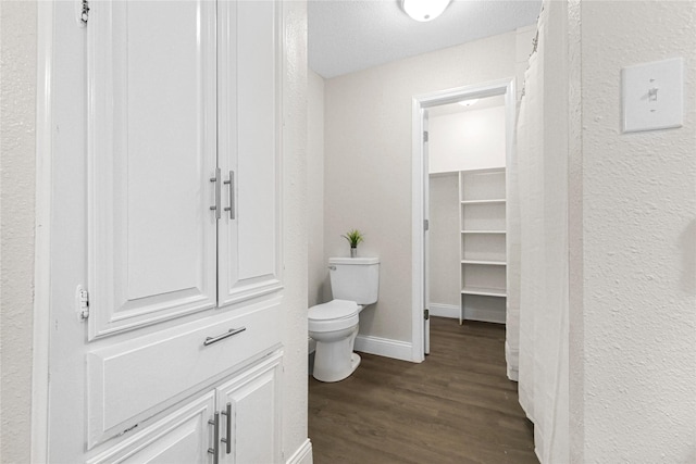 3101 Possum Trot St, Brenham, TX 77833 - bathroom featuring wood finished floors and a textured wall