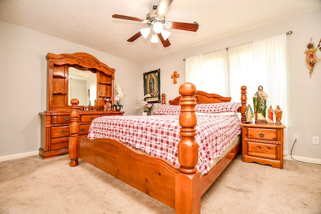 2727 Piney Lake Ct, Houston, TX 77038 - bedroom with light carpet and a ceiling fan