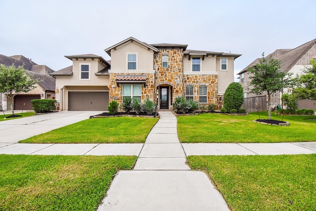 19019 Kimber Creek Ln, Cypress, TX 77429 - view of front of property with stucco siding, stone siding, an attached garage, and concrete driveway