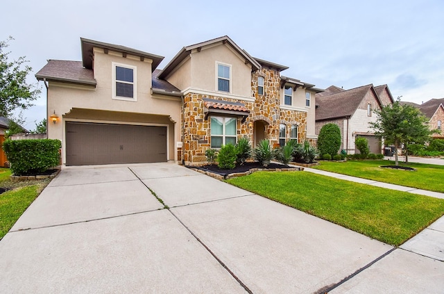 19019 Kimber Creek Ln, Cypress, TX 77429 - view of front of home featuring stone siding, stucco siding, concrete driveway, a front lawn, and an attached garage