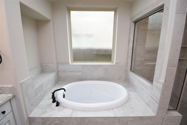 19019 Kimber Creek Ln, Cypress, TX 77429 - full bath featuring a garden tub and vanity