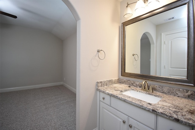 19019 Kimber Creek Ln, Cypress, TX 77429 - bathroom with vanity and lofted ceiling