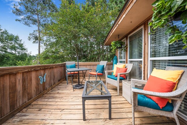 1501 Wimbledon Dr, Huntsville, TX 77340 - wooden deck featuring an outdoor hangout area