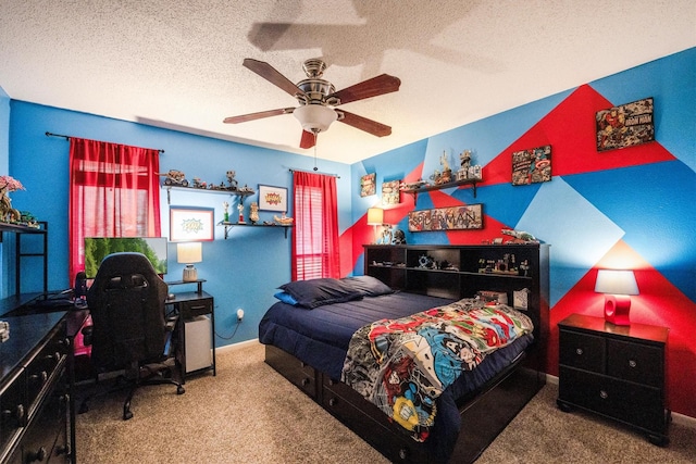 1501 Wimbledon Dr, Huntsville, TX 77340 - bedroom with carpet floors, an office area, a textured ceiling, and ceiling fan
