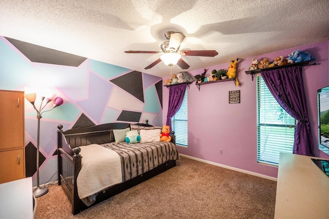 1501 Wimbledon Dr, Huntsville, TX 77340 - bedroom featuring a textured ceiling, carpet, and ceiling fan