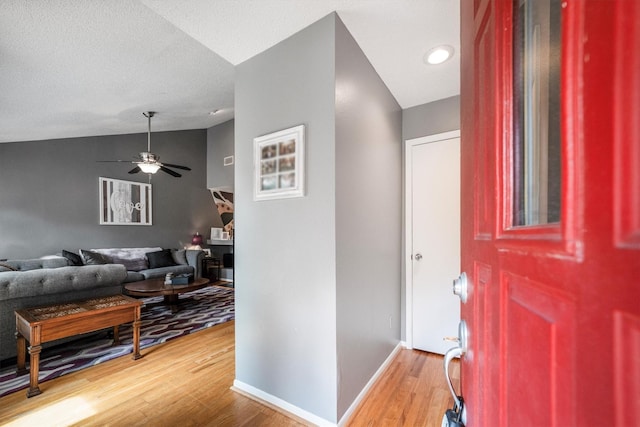 1501 Wimbledon Dr, Huntsville, TX 77340 - foyer with vaulted ceiling, light wood-style floors, and ceiling fan