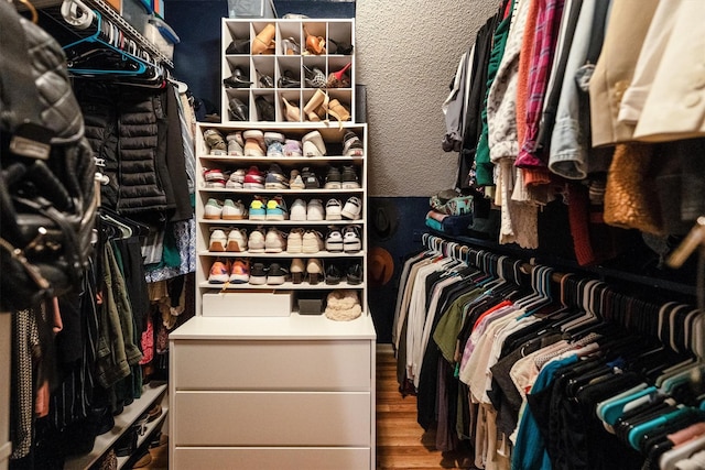 1501 Wimbledon Dr, Huntsville, TX 77340 - spacious closet featuring wood finished floors