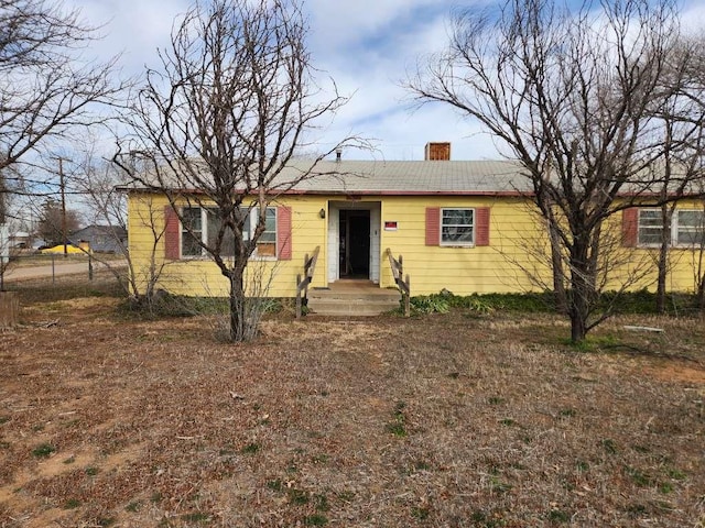 701 E Purdue St, Lubbock, TX 79403 - ranch-style home featuring a chimney