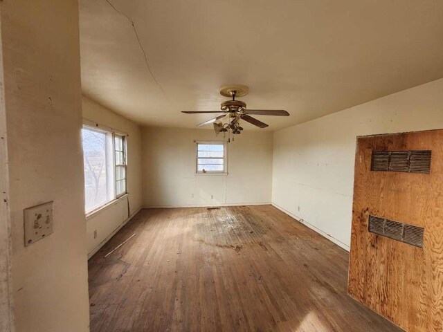 701 E Purdue St, Lubbock, TX 79403 - unfurnished room featuring wood-type flooring and a ceiling fan