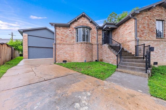 3915 Southmore Cir, Houston, TX 77004 - view of front of property with brick siding and an outbuilding