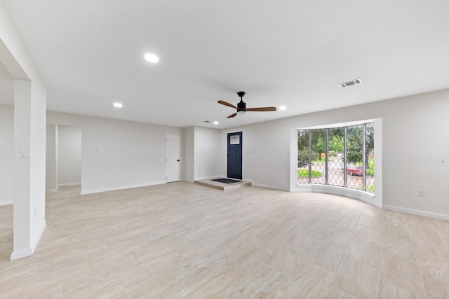 3915 Southmore Cir, Houston, TX 77004 - unfurnished living room with a ceiling fan and recessed lighting