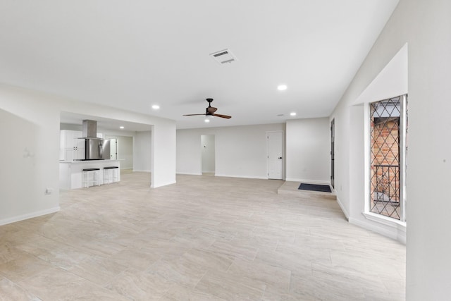 3915 Southmore Cir, Houston, TX 77004 - unfurnished living room featuring recessed lighting and a ceiling fan