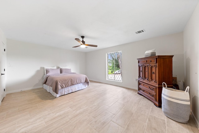3915 Southmore Cir, Houston, TX 77004 - bedroom with a ceiling fan and wood tiled floors