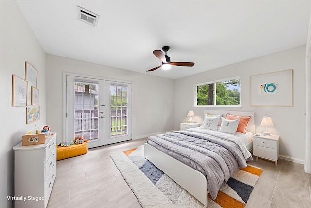 3915 Southmore Cir, Houston, TX 77004 - bedroom with multiple windows, french doors, access to outside, and a ceiling fan