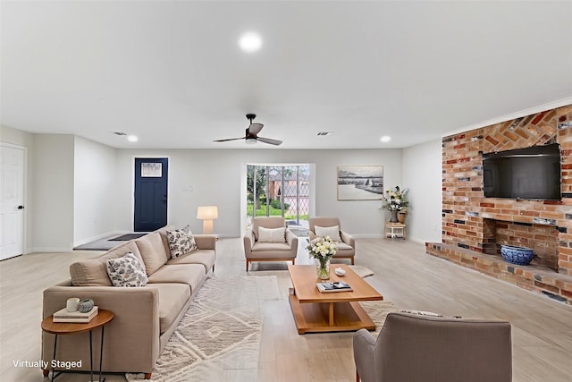 3915 Southmore Cir, Houston, TX 77004 - living area featuring ceiling fan, wood finished floors, and recessed lighting