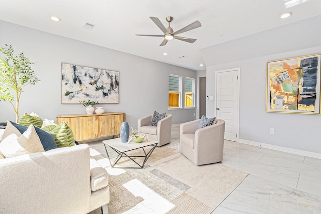 9311 Noel St, Houston, TX 77033 - living room with ceiling fan, light marble finish floors, and recessed lighting