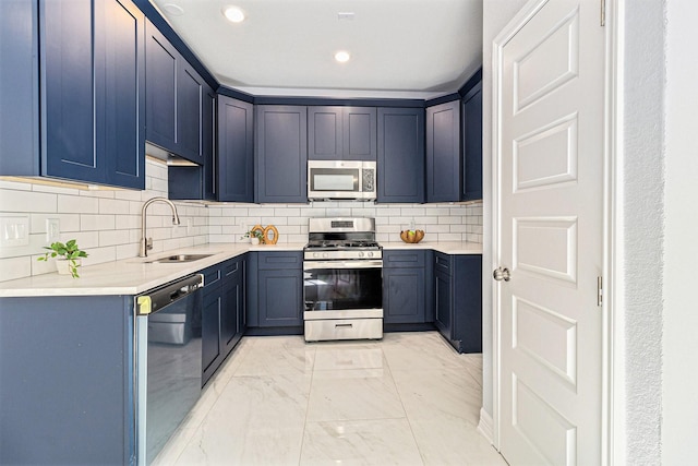 9311 Noel St, Houston, TX 77033 - kitchen featuring appliances with stainless steel finishes, light marble finish flooring, recessed lighting, light countertops, and tasteful backsplash