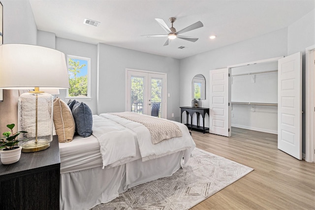 9311 Noel St, Houston, TX 77033 - bedroom featuring access to outside, french doors, light wood-type flooring, recessed lighting, and ceiling fan