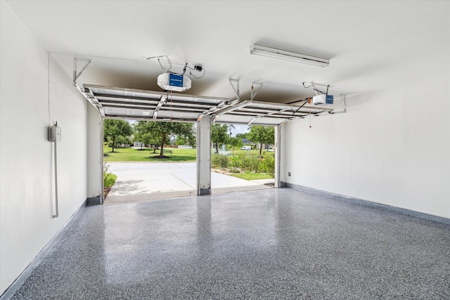25207 Oak Star Dr, Spring, TX 77389 - garage featuring a garage door opener