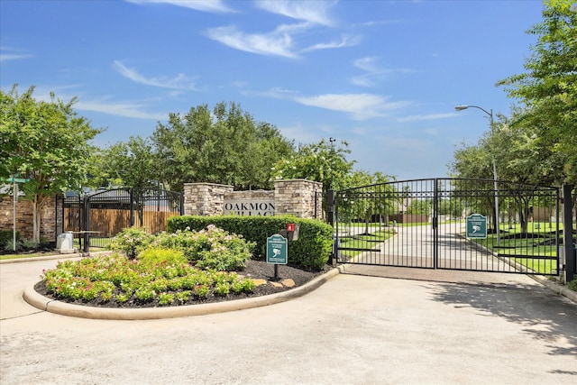 25207 Oak Star Dr, Spring, TX 77389 - community sign featuring a gate