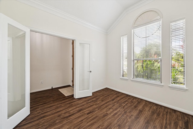 25207 Oak Star Dr, Spring, TX 77389 - empty room with lofted ceiling, crown molding, healthy amount of natural light, dark wood-type flooring, and french doors
