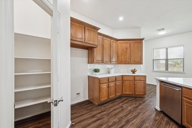 25207 Oak Star Dr, Spring, TX 77389 - kitchen featuring dark wood finished floors, brown cabinets, light countertops, and recessed lighting