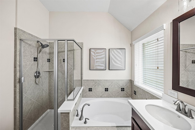 12314 Meadow Blossom Ln, Cypress, TX 77433 - full bath featuring vanity, a bath, a shower stall, and lofted ceiling