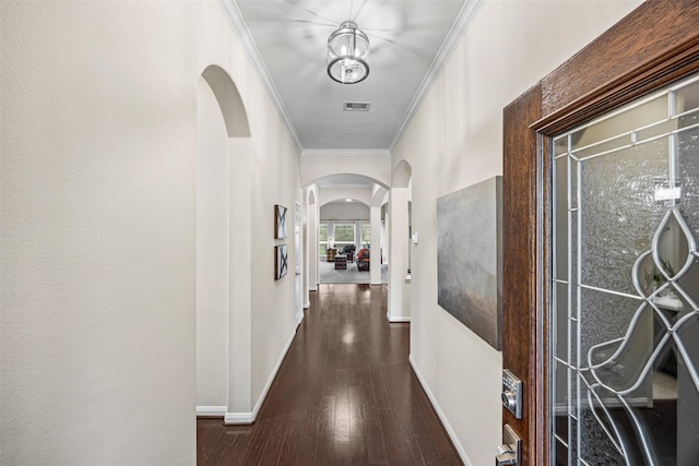 12314 Meadow Blossom Ln, Cypress, TX 77433 - hallway featuring arched walkways, ornamental molding, and hardwood / wood-style flooring