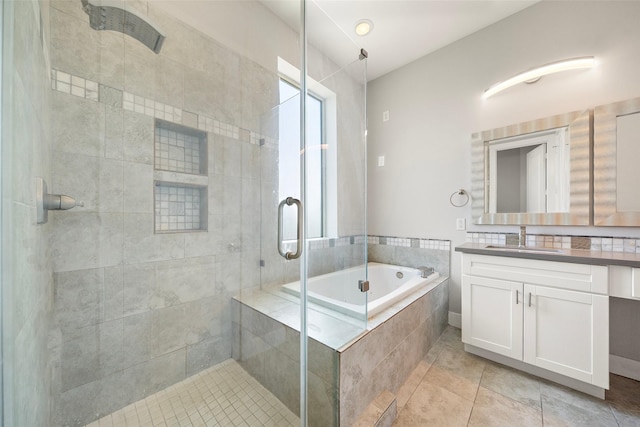 1005 Bingham St Unit 5, Houston, TX 77007 - full bath featuring vanity, a shower stall, a garden tub, and tile patterned flooring