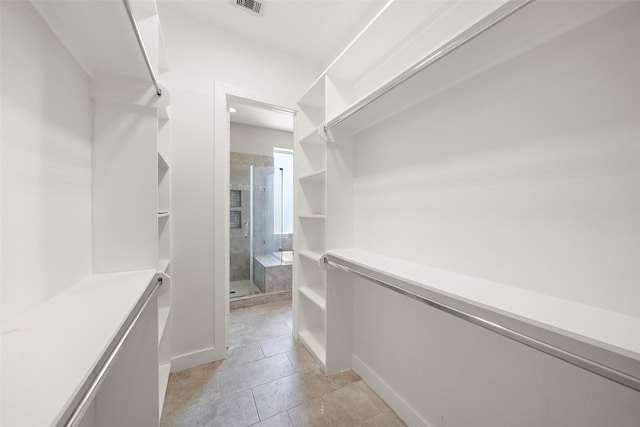 1005 Bingham St Unit 5, Houston, TX 77007 - walk in closet with light tile patterned floors