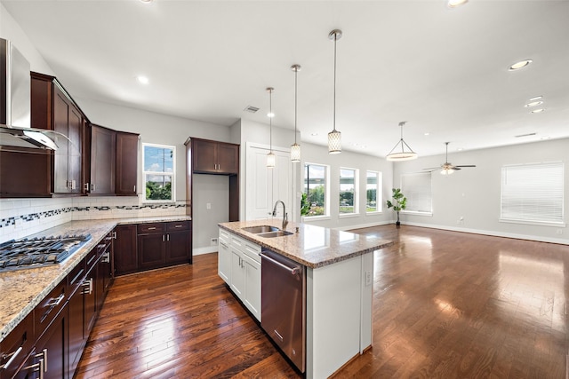 1005 Bingham St Unit 5, Houston, TX 77007 - kitchen featuring stainless steel appliances, wall chimney range hood, dark wood-style floors, ceiling fan, and dark brown cabinets
