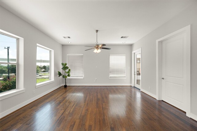1005 Bingham St Unit 5, Houston, TX 77007 - unfurnished room with healthy amount of natural light, dark wood finished floors, and a ceiling fan