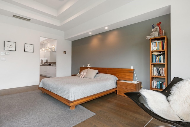 18 Pronghorn Pl, The Woodlands, TX 77389 - bedroom with wood finished floors, recessed lighting, and ensuite bath