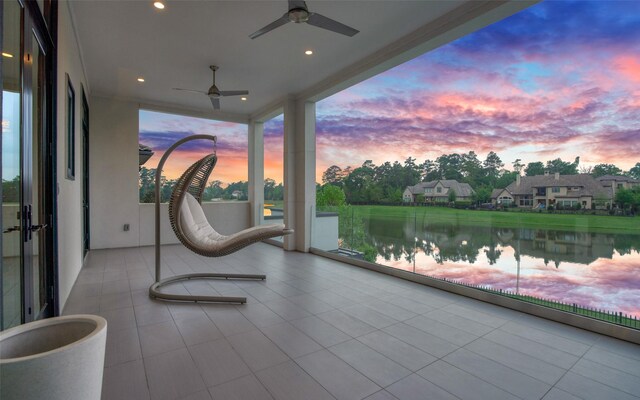 18 Pronghorn Pl, The Woodlands, TX 77389 - view of patio / terrace featuring ceiling fan and a water view