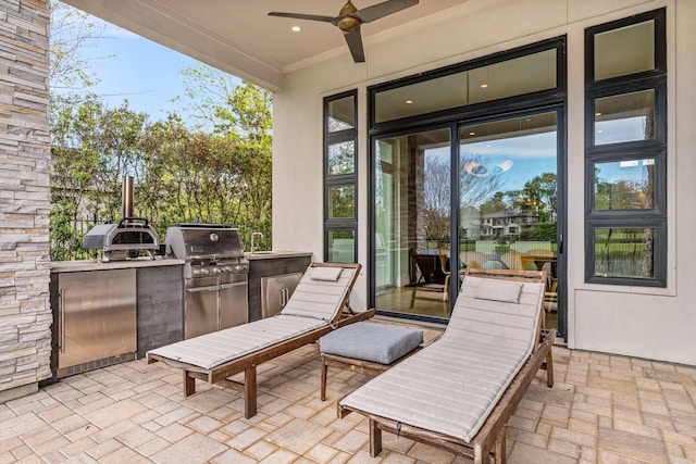 18 Pronghorn Pl, The Woodlands, TX 77389 - view of patio featuring area for grilling and a ceiling fan