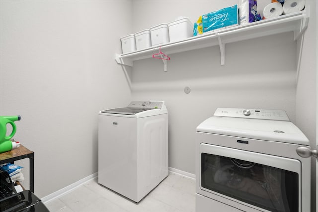 13402 Rain Lily, Texas City, TX 77568 - laundry room featuring washer and dryer and baseboards