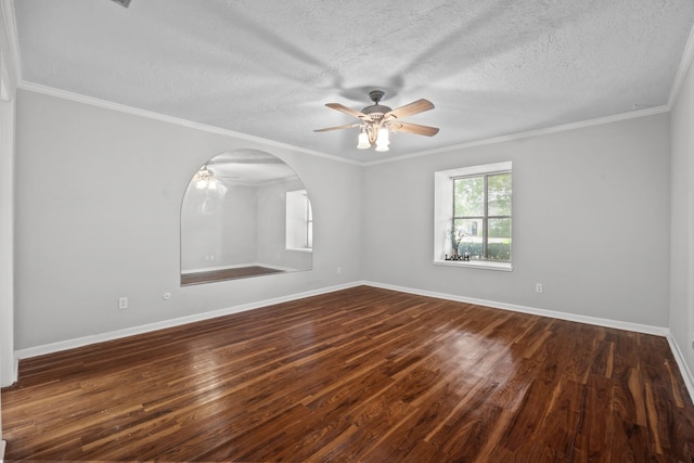 1406 Diana Ct, Houston, TX 77062 - spare room with wood finished floors, ceiling fan, a textured ceiling, ornamental molding, and arched walkways