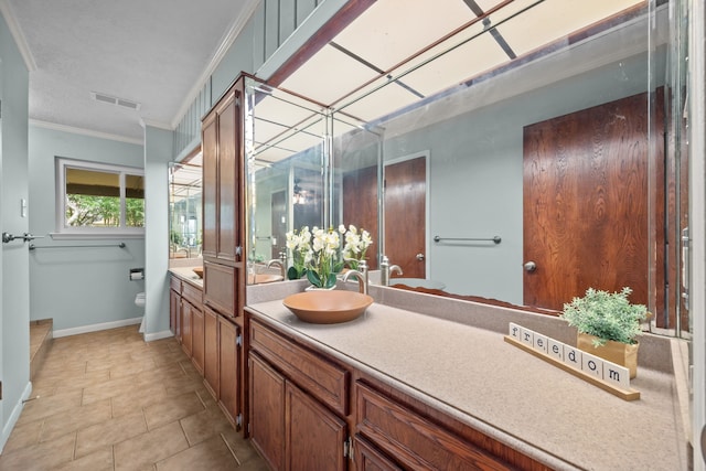 1406 Diana Ct, Houston, TX 77062 - bathroom featuring vanity, ornamental molding, and tile patterned flooring