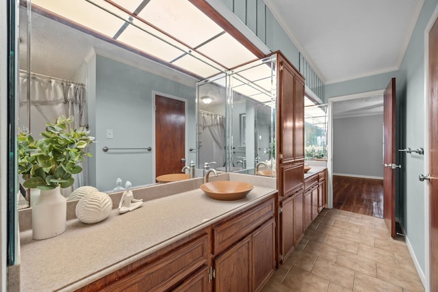 1406 Diana Ct, Houston, TX 77062 - bathroom featuring crown molding, vanity, and a shower with curtain
